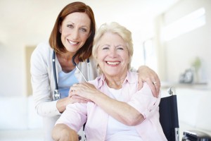 Portrait of a mature nurse and her elderly patient sharing an affectionate moment together
